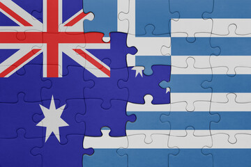 puzzle with the colourful national flag of greece and flag of australia.