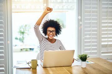 Portrait, win and black woman on laptop in home office for lottery success, celebration and remote work achievement goal. Face, smile and fist pump for bonus promotion, good news or freelancer prize