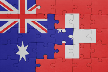 puzzle with the colourful national flag of switzerland and flag of australia.