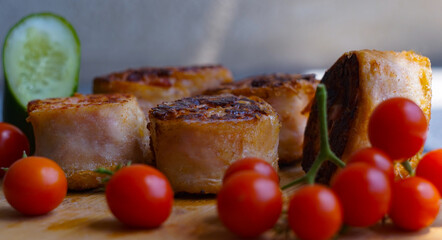 Roulette on the board with wheat and tomatoes