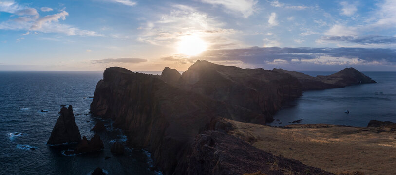 Panoramic view of Cape Ponta de Sao Lourenco, Canical, East coast of Madeira Island, Portugal. Scenic volcanic landscape of Atlantic Ocean, rocks and cllifs and sky. Seen from popular hiking trail PR8