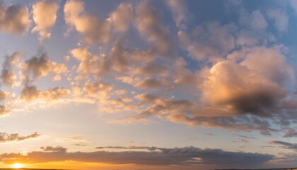 beautiful panoramic sky with glowing clouds at sunset