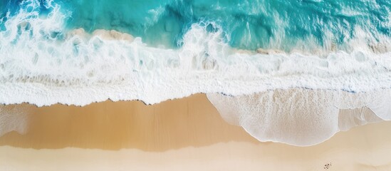A breathtaking sea landscape with white sand beach and turquoise water seen from a top view captured by a UAV drone Perfect for copy space