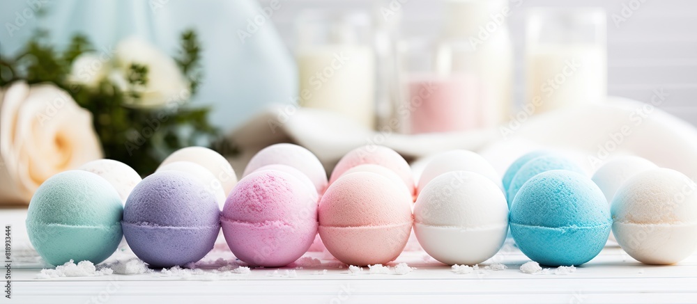 Poster a vibrant assortment of bath bombs displayed on a pristine white towel in a bathroom setting with am