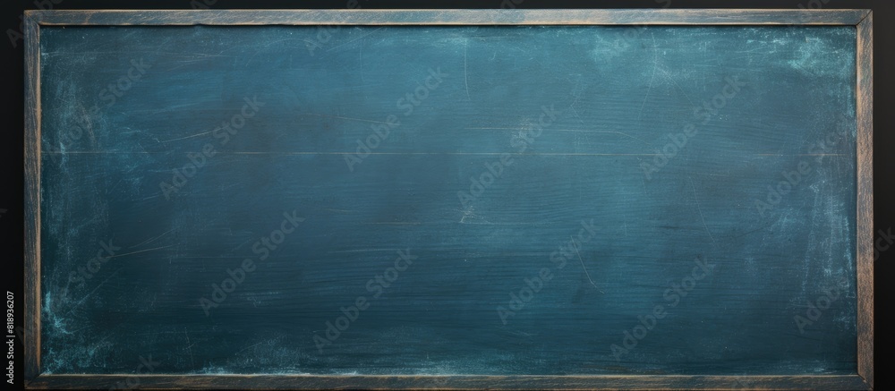 Poster a dark blue chalkboard with traces of erasing featuring a full surface frame and a textured backgrou