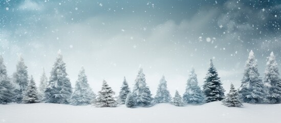 Naklejka premium A winter scene with snow covered Christmas trees serves as a background for a delightful holiday greeting with copy space