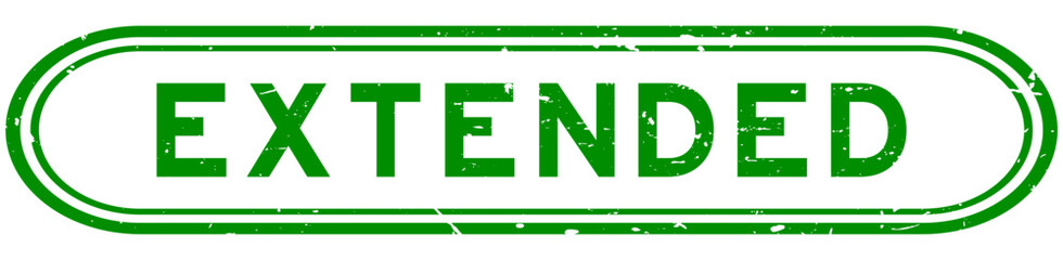 Grunge green extended word rubber seal stamp on white background