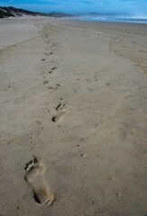 Footprints in the sand on Swartvlei Beach near Sedgefield.