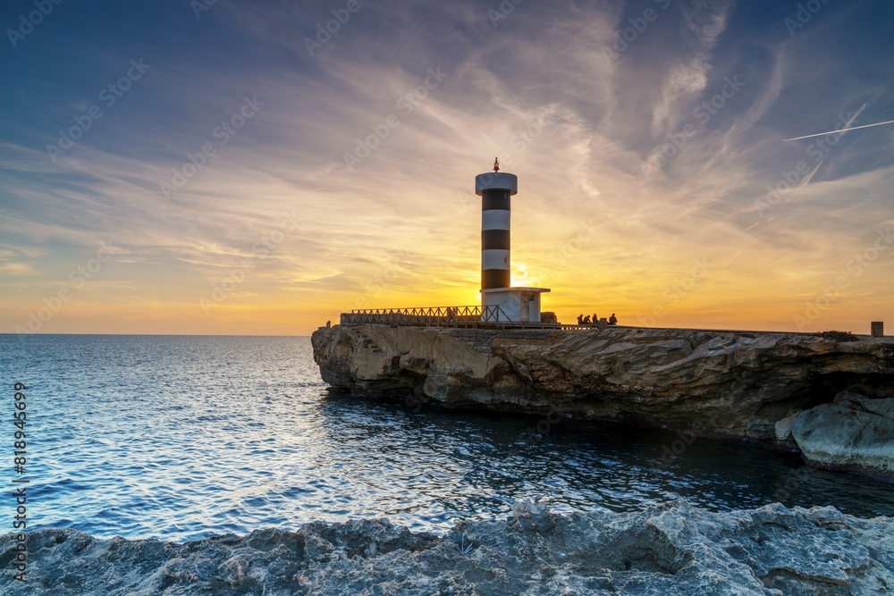 Sticker view of the lighthouse at Colonia Sant Jordi in Mallorca at sunset