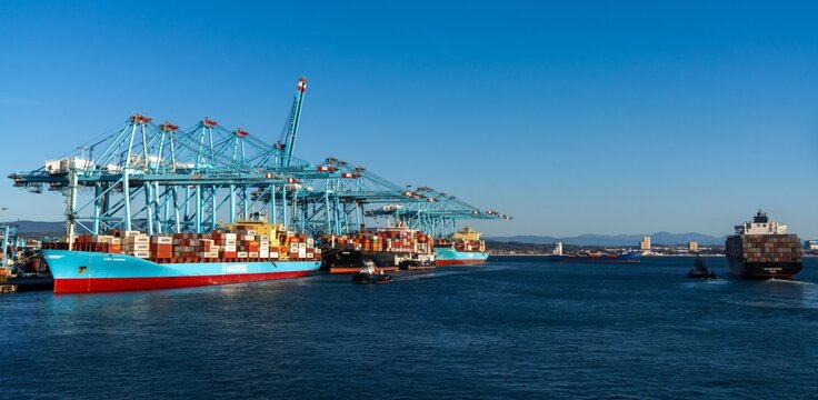 container ships being loaded and unloaded in the industrial port of Algeciras in southern Spain