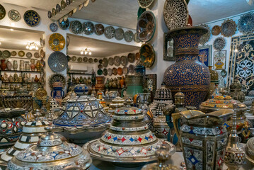 close-up view of traditional pottery and mosaic work in a Moroccan pottery factory in downtown Fez
