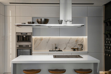 Metal hanging kitchen hood in white modern kitchen with island