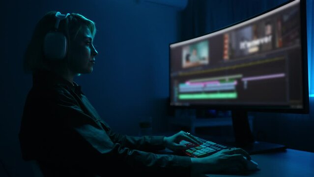 Freelancer video editor create film for social networks. Work in program for video editing on personal computer. Content creator in digital multimedia company processing movie, slow motion.