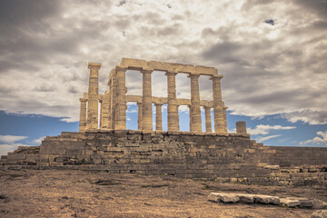 Fototapeta premium Sounion, Greece, May 4th 2024: The legendary Temple of Poseidon in Sounion cape, Greece