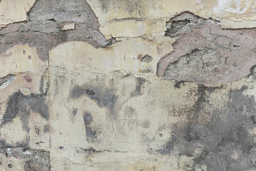 A wall in poor condition with cement stains on the paint and peeling pieces. Vector cement texture background