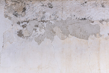 A wall in poor condition with cement stains in the paint. Vector cement texture and paint background