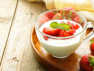 dessert yogurt with fresh strawberries in a glass