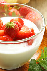 dessert yogurt with fresh strawberries in a glass