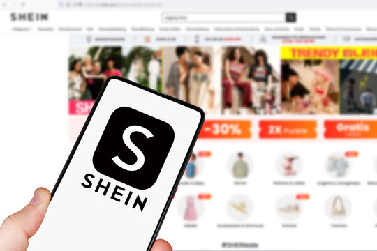 Shein logo online marketplace ecommerce on a mobile phone and computer
