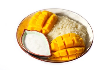 Sweet and delicious with Mango sticky rice on bamboo mat with white background on isolated concept.