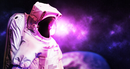 Astronaut wear spacesuit for space operation . ,exploring space travel experiences .,Elements of this image furnished by NASA