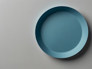 Vibrant blue plate displayed on neutral gray wall