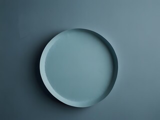 Vibrant blue plate displayed on neutral gray wall