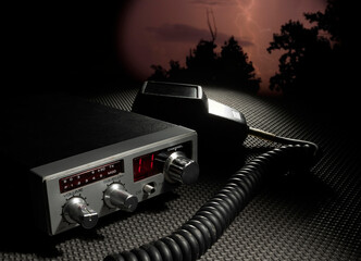 CB radio on channel 11 with lightning behind