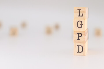 LGPD letter. Concept of brazilian data protection law written on wooden cubes isolated on white background.