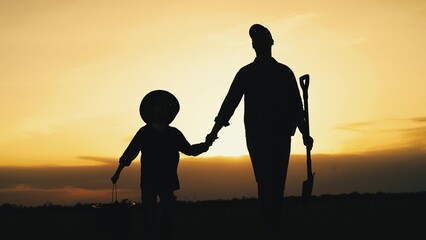 boy son child father tree shovel plant farmer gardener field garden silhouette sunset family parenting happy, sunset family silhouette, education in agriculture, nurturing tree with child, sunset tree