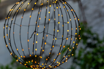 a string of lights as a decorative ball at a party