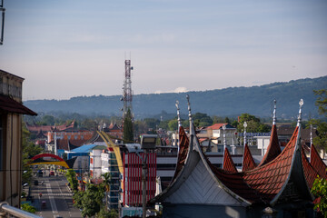 Bagonjong roofs are like buffalo horns on buildings near Jam Gadang in Bukittinggi. The...