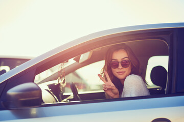 Woman, car and sunglasses by window in summer for travel, freedom and vacation with sunshine...