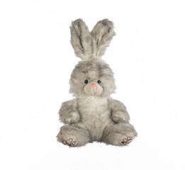 soft plush rabbit toy with long ears isolated on white background