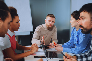 Intense Discussion Among Coworkers in Office