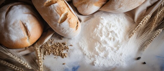 Making bread concept Loaves near flour wheat ears top view copy space - Powered by Adobe