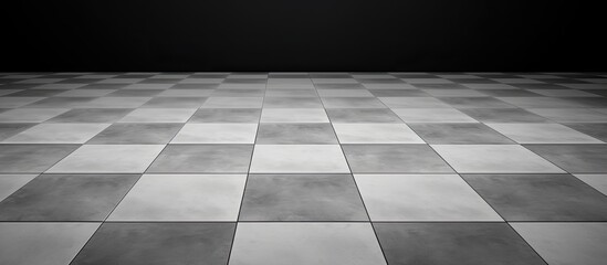 Black and white tiled floor with a background in faded grey tones Perfect for a copy space image