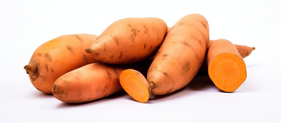 Fresh sweet potatoes on a white background. copy space available - Powered by Adobe
