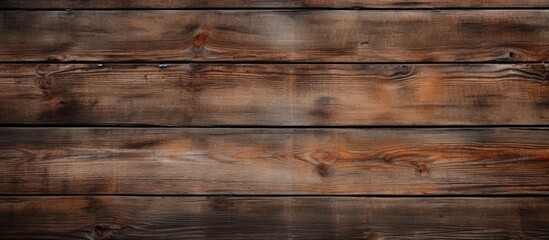 Naklejka premium top view of aged wooden planks surface for background. copy space available
