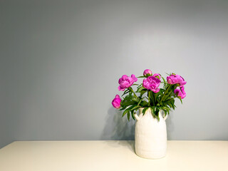 Elegant Bouquet of Pink Peonies in White Ceramic Vase