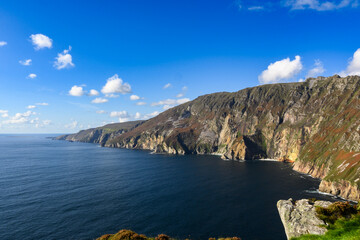 Majestic Lake Surrounded by Towering Mountains