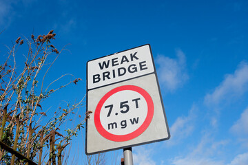 glasgow Scotland: 12th Feb 2024: Weak Bridge warning traffic sign 7.5 tonnes. Sunny day blue sky...