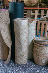 Traditional crafts of bamboo baskets and water hyacinth mats sold in traditional markets.
