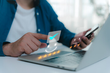 Fototapeta premium Business people touch virtual screens on the happy Smile face icon to give satisfaction in service. rating very impressed. Customer service and Satisfaction concept.