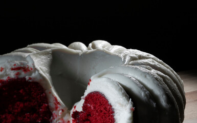 Sweet frosting on a red velvet cake