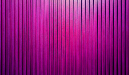 vertical wooden slats texture for decoration with light from above. abstract neon pink and violet walnut wooden slats in vertical striped line pattern used as background. futuristic concept.