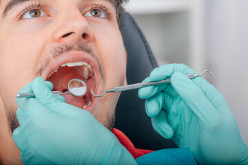 young man patient in the dental clinic