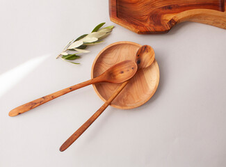 Wooden kitchen utensils stacked view, spoon and spatula