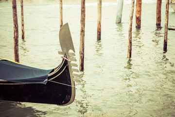 The bow of a gondola in the city of Venice, Italy.