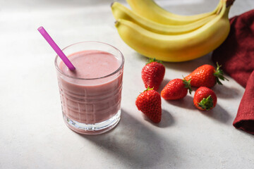 Strawberry and banana smoothie drink, blended cocktail, milkshake in a glass